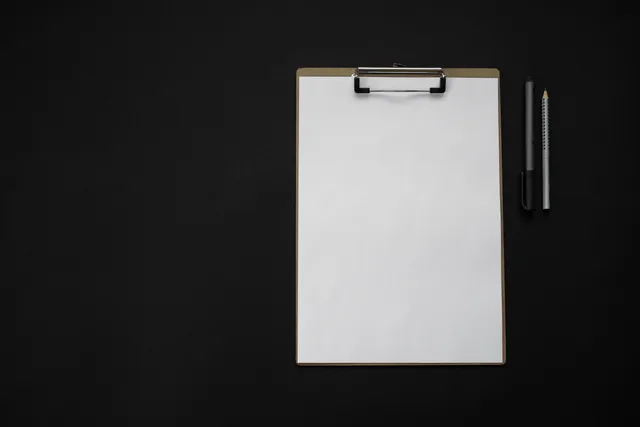 Flat lay of a blank clipboard with pen and pencil on a black background, ideal for mockups. Why American Pantry Scout has no product reviews yet, and the evidence it would need