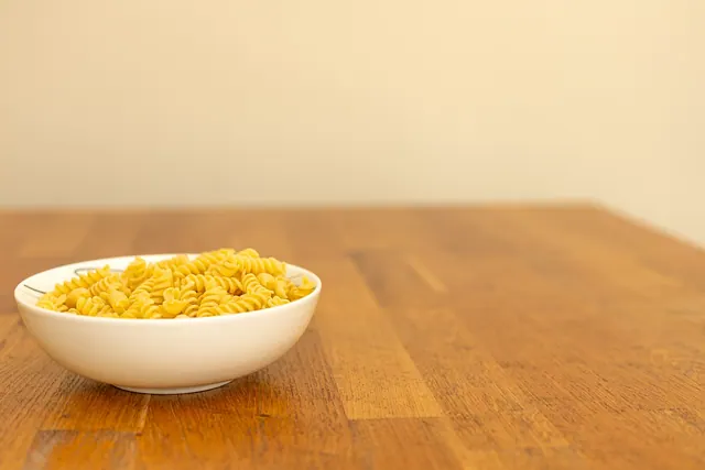 pasta, fusilli, bowl, raw, ingredient, italian, wood, table, cooking, dry, vegetarian, nutrition, homemade, recipe, yellow, carbohydrate, culinary, meal, food storage, kitchen, pan