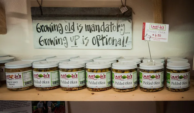 Jars of pickled okra sit on the shelf at Laurie Jo’s Southern Style Canning business in Norman Park, Colquitt County, GA on Mar. 7, 2013. The business has increased its production to 12 items that now includes pickled green tomatoes, pickled okra, pickled asparagus pickled green beans, red and green. Pantry jar sales channels: what they cannot prove