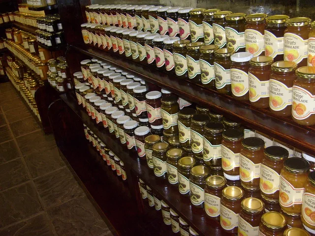 jam, preserves, shelf, display, country store, jar, fruit, homemade, glass, sweet, marmalade, jelly, berry, fresh, ingredient, breakfast, canned, natural, strawberry, raspberry, container, tasty, delicious, product, grocery, apricot, storage, shopping, store, apple, supermarket, retail, shop, purchase, stand, marketplace, commerce, variety, aisle, mart, consume, economy, row, section, stock, department, wholesale, buy, consumption, brown shopping, brown apple, brown shop, brown fruits, brown economy, brown grocery, brown groceries, brown breakfast, country store, grocery, grocery, supermarket, supermarket, supermarket, mart, mart, mart, mart, wholesale, wholesale, wholesale, wholesale, wholesale, consumption. Asheville and Burlington compared as small-city pantry markets